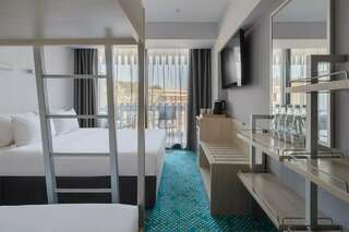 Гостиница Ялта-Интурист Ялта Стандарт улучшенный с двуспальной и двухъярусной кроватями (YALTA INTOURIST)-1